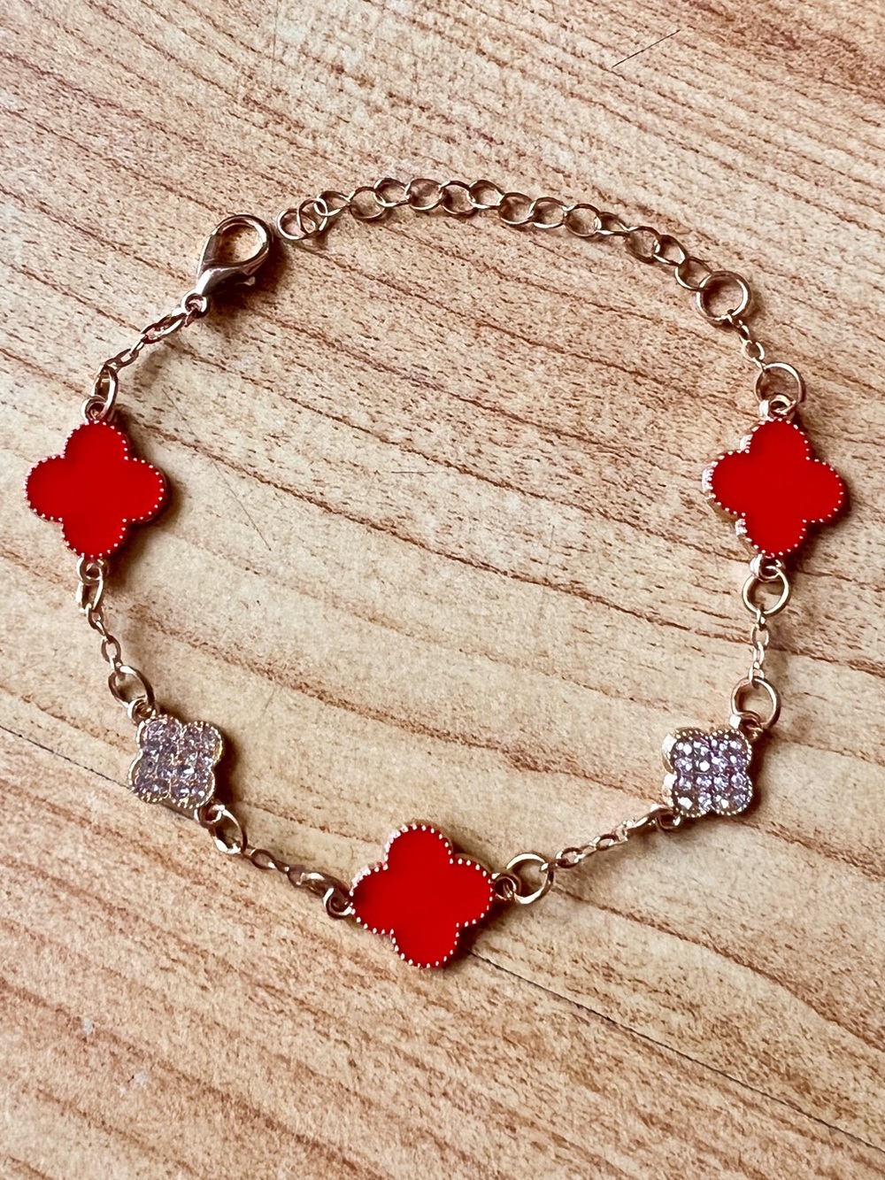 Red Clover Motif Gold Bracelet with Crystal Accents